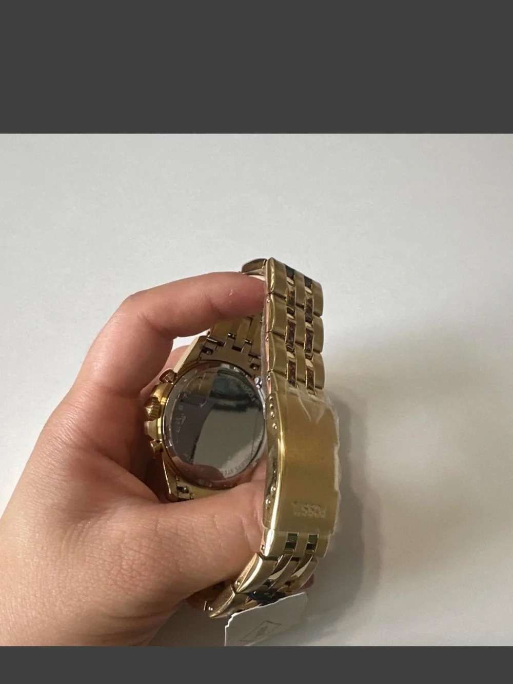 Fossil gold tone